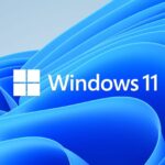 Windows 11 logo with a blue abstract background.